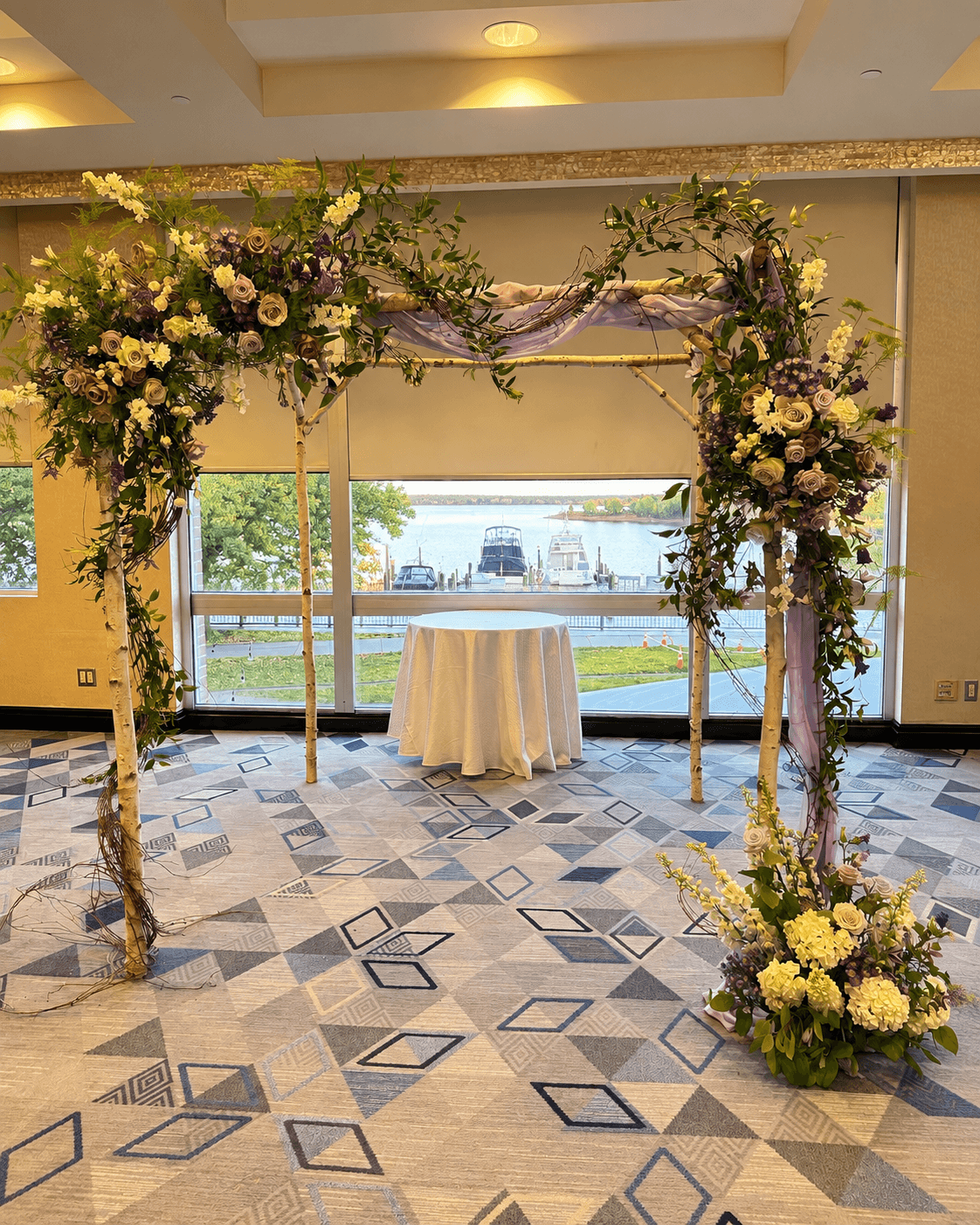 Seven-sided heptagonal wooden wedding arch for a distinctive ceremony backdrop